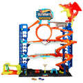 Hot Wheels Let's Race Netflix   Ultimative Garage   Mehrere Ebenen Parkgarage, 3ft hoch, mit 2 Die Cast Autos, ab 5 Jahren, Rennspaß, Stunt Abenteuer, Drachenkampf, Autowaschanlage, Fahrstuhl, HKX48: Spielzeug